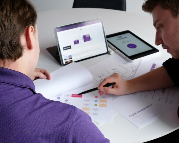 Power Platform Consultancy expert discusses power automate with colleague 