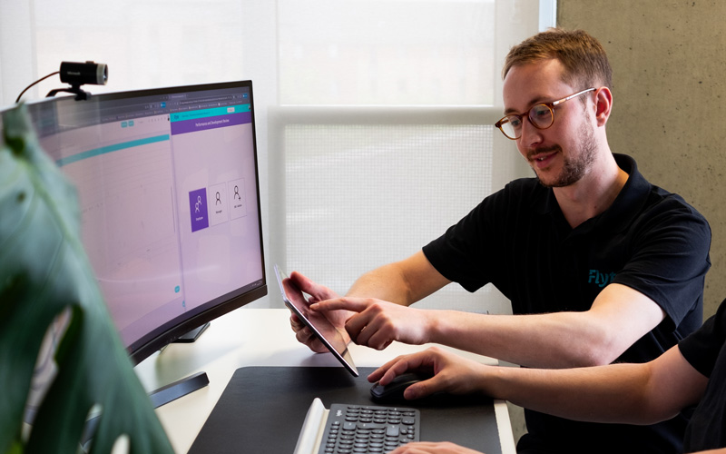 Microsoft Power Platform break fix support – Flyte consultant reviewing solutions with a client, SLA-backed bug fix and ongoing maintenance service Microsoft Power Platform break fix support – Flyte consultant reviewing solutions with a client, SLA-backed bug fix and ongoing maintenance service